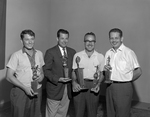 Men Holding Their Trophies, Tampa, Florida by George Skip Gandy IV