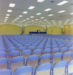 Meeting Room with Chairs Facing a Stage in Curtis Hixon Convention Center, Tampa, Florida, A by George Skip Gandy IV