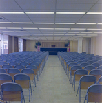 Meeting Room with Chairs Facing a Stage in Curtis Hixon Convention Center, Tampa, Florida, B by George Skip Gandy IV