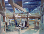 Two Employees Working with a Fiberglass Loom, A by George Skip Gandy IV