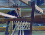 Employee Working with a Fiberglass Loom, I by George Skip Gandy IV