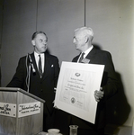 President's "E" Certificate for Exports Presented to Corrigan and Sons, Inc, A by George Skip Gandy IV