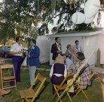 Attendees Socialize at a Cosmopolitan Realty and Investment Corp. Event, A by George Skip Gandy IV