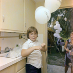 Child at a Cosmopolitan Realty and Investment Corp. Event by George Skip Gandy IV