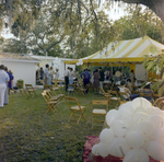 Attendees Socialize at a Cosmopolitan Realty and Investment Corp. Event, C by George Skip Gandy IV