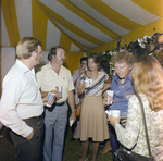 Attendees Socialize at a Cosmopolitan Realty and Investment Corp. Event, D by George Skip Gandy IV