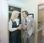 Bill Merritt and Cosmopolitan Realty and Investment Corp. Employee Socialize Indoors During a Company Event by George Skip Gandy IV