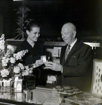 Marilyn Liske Presents Imprevu by Coty to Patron at a Maas Brother Department Store, A by George Skip Gandy IV