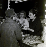 Marilyn Liske Presents Coty Products to a Customer at a Maas Brothers Department Store, A by George Skip Gandy IV