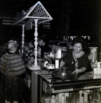 Employee Adjusts Decorative Fountain at a Maas Brothers Department Store by George Skip Gandy IV