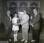 Barbara Kolsar and Stuart Daigneau and Two Others Pose for a Photo During a Sarah Coventry Event at the Manger Motor Inn by George Skip Gandy IV