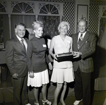 Reba Morris, Edna Chandler, and Two Others Pose for a Photo During a Company Event at the Manger Motors Inn by George Skip Gandy IV