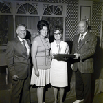 Four Sarah Coventry Employees Pose for a Photo During a Company Event at the Manger Motor Inn, A by George Skip Gandy IV