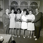 Six Sarah Coventry Employees Pose for a Photo During a Company Event at the Manger Motor Inn, B by George Skip Gandy IV