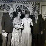 Four Sarah Coventry Employees Pose for a Photo During a Company Event at the Manger Motor Inn, E by George Skip Gandy IV