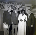 Four Sarah Coventry Employees Pose for a Photo During a Company Event at the Manger Motor Inn, G by George Skip Gandy IV