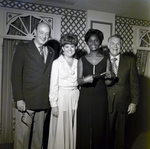 Four Sarah Coventry Employees Pose for a Photo During a Company Event at the Manger Motor Inn, I by George Skip Gandy IV