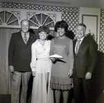 Four Sarah Coventry Employees Pose for a Photo During a Company Event at the Manger Motor Inn, O by George Skip Gandy IV