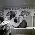 Two Attendees Pose for a Photo During a Sarah Coventry Company Event at the Manger Motor Inn by George Skip Gandy IV