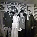 Four Sarah Coventry Employees Pose for a Photo During a Company Event at the Manger Motor Inn, S by George Skip Gandy IV