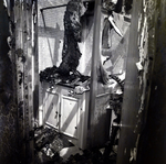 Fire Damaged Cabinets Surrounded by Debris, Dr. Anthony Spoto's Medical Office, June 8, 1973 by George Skip Gandy IV