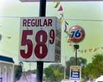 Fuel Price Flip Sign Advertising the Cost of Fuel by George Skip Gandy IV