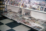 Magazine Rack at Kwik Chek Grocery Store, August 1959, C by George Skip Gandy IV