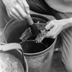 Person Cleaning Metal Parts, Tampa, Florida, B by George Skip Gandy IV