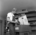 Dancey Employee Cleaning Metal Parts, D by George Skip Gandy IV