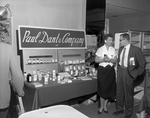 Attendees at Paul Dant and Company Booth, A by George Skip Gandy IV