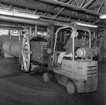 Worker Operating a Forklift, A by George Skip Gandy IV