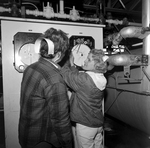 Women Monitoring a Control Panel, B by George Skip Gandy IV