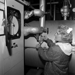 Women Monitoring a Control Panel, E by George Skip Gandy IV