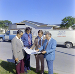 Four Men Study Building Plans, A by George Skip Gandy IV