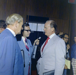 Man Interviews Man at the Host Airport Hotel, Tampa, Florida by George Skip Gandy IV