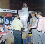 William Tucker and F. Schneider Speak with Owens-Corning Fiberglas Representative, A by George Skip Gandy IV