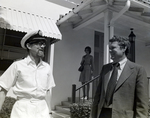 Ship Captain and Man Outside Eller & Company Building, Tampa, Florida, F by George Skip Gandy IV