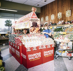 Diamond Walnuts Grocery Store Display, A by Skip Gandy