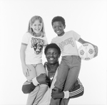 Portrait for Tampa Bay Rowdies, Player Posing with Children, A by Skip Gandy