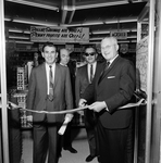 Opening of Eagle Army Navy Discount Store on Armenia Avenue, A by Skip Gandy