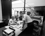 EMS Office with Ambulance Outside Window, B by Skip Gandy