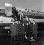 Group of Men in Front of Eastern Air Lines, Inc., A by Skip Gandy