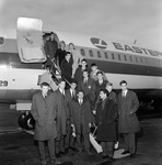 Group of Men in Front of Eastern Air Lines, Inc., B by Skip Gandy