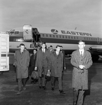 Group of Men in Front of Eastern Air Lines, Inc., C by Skip Gandy