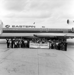 Grover Cleveland High School and Eastern Air Lines Airplane, A by Skip Gandy