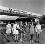 Young Women with Eastern Air Lines Airplane, A by Skip Gandy