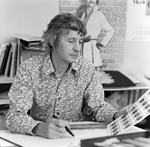 Man in Floral Shirt Working at Desk, Tampa, Florida, F by George Skip Gandy IV