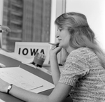 Woman Holding Pen at Desk, Tampa, Florida, A by George Skip Gandy IV