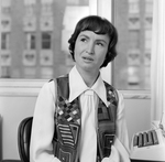 Woman at Desk in Tampa, Florida by George Skip Gandy IV