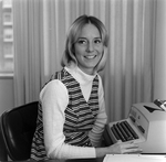 Woman at Desk with Typewriter, Tampa, Florida, B by George Skip Gandy IV